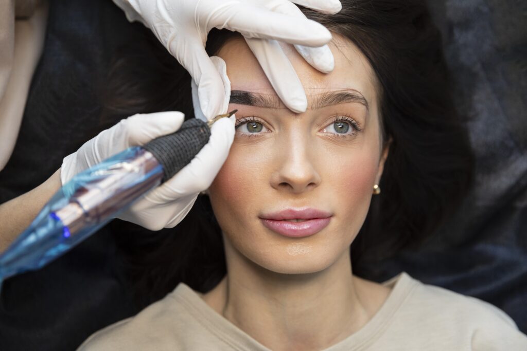 A doctor is doing Permanent Makeup treatment of a patient